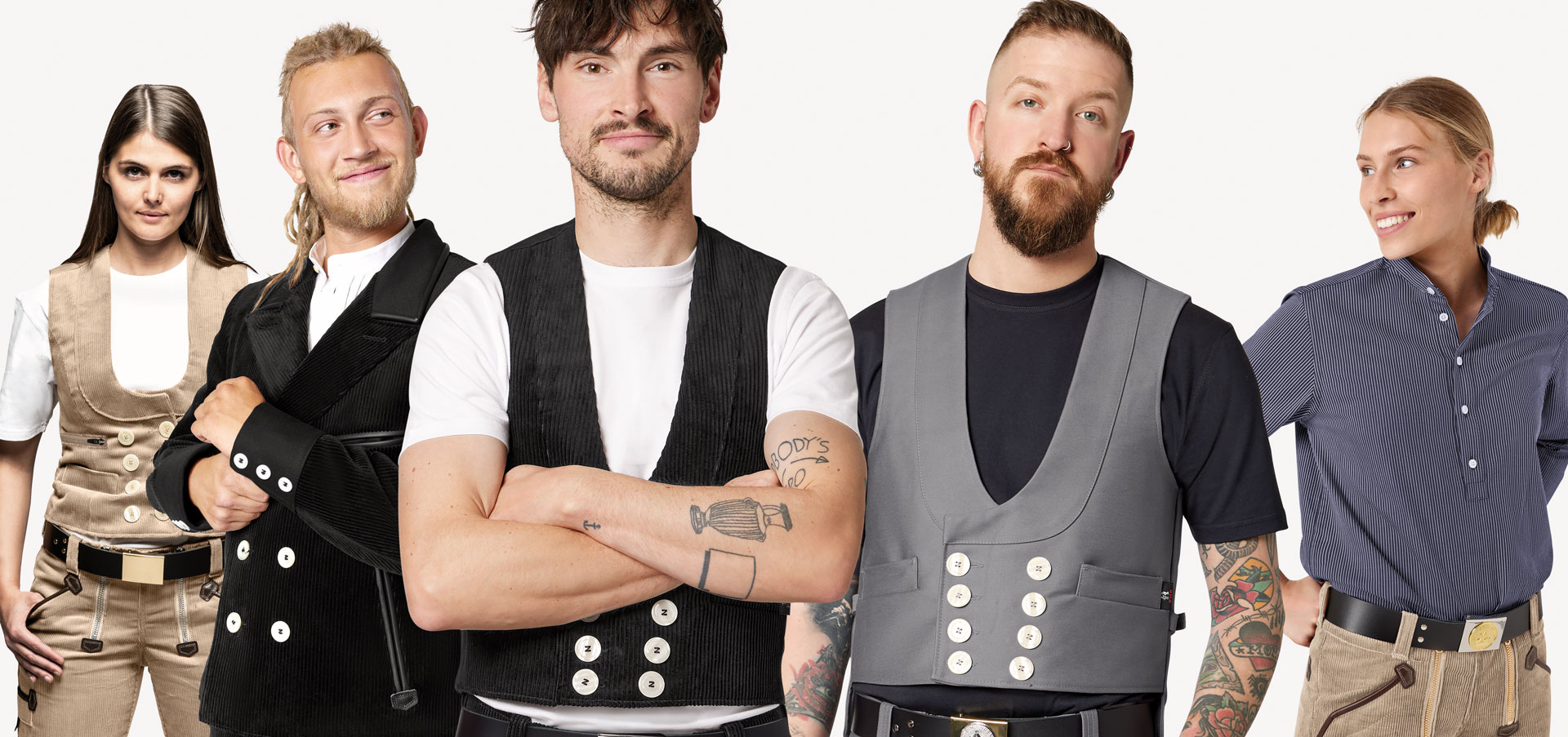 FHB Zunftkleidung für Damen und Herren – traditionelle Workwear mit Stil Drei Männer und zwei Frauen in FHB Zunftkleidung – traditionelle Arbeitskleidung für das Handwerk